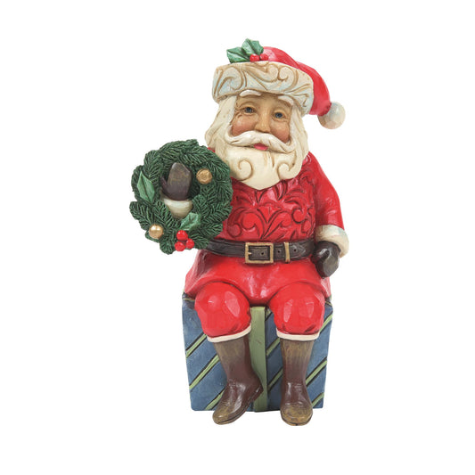 Enesco Jim Shore Heartwood Creek Santa Sitting on Gifts Miniature Figurine, 3.74 Inch, Multicolor