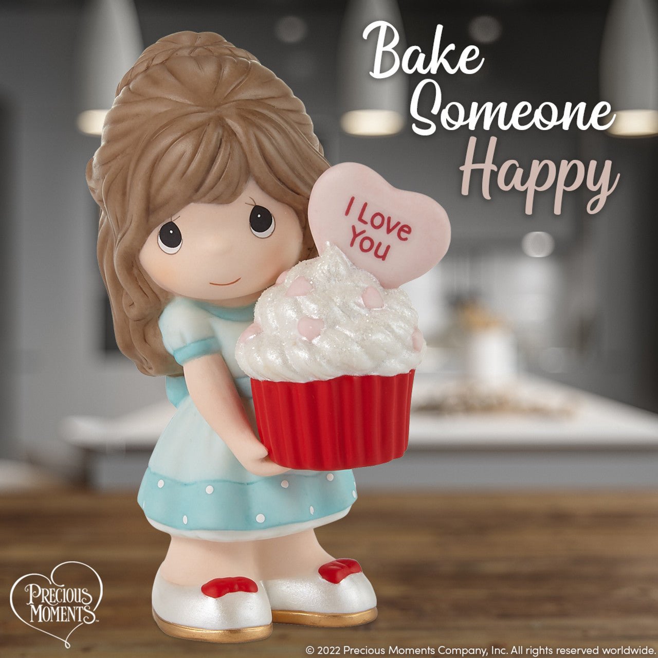 Girl Holding Red Velvet Cupcake Figurine - Brunette