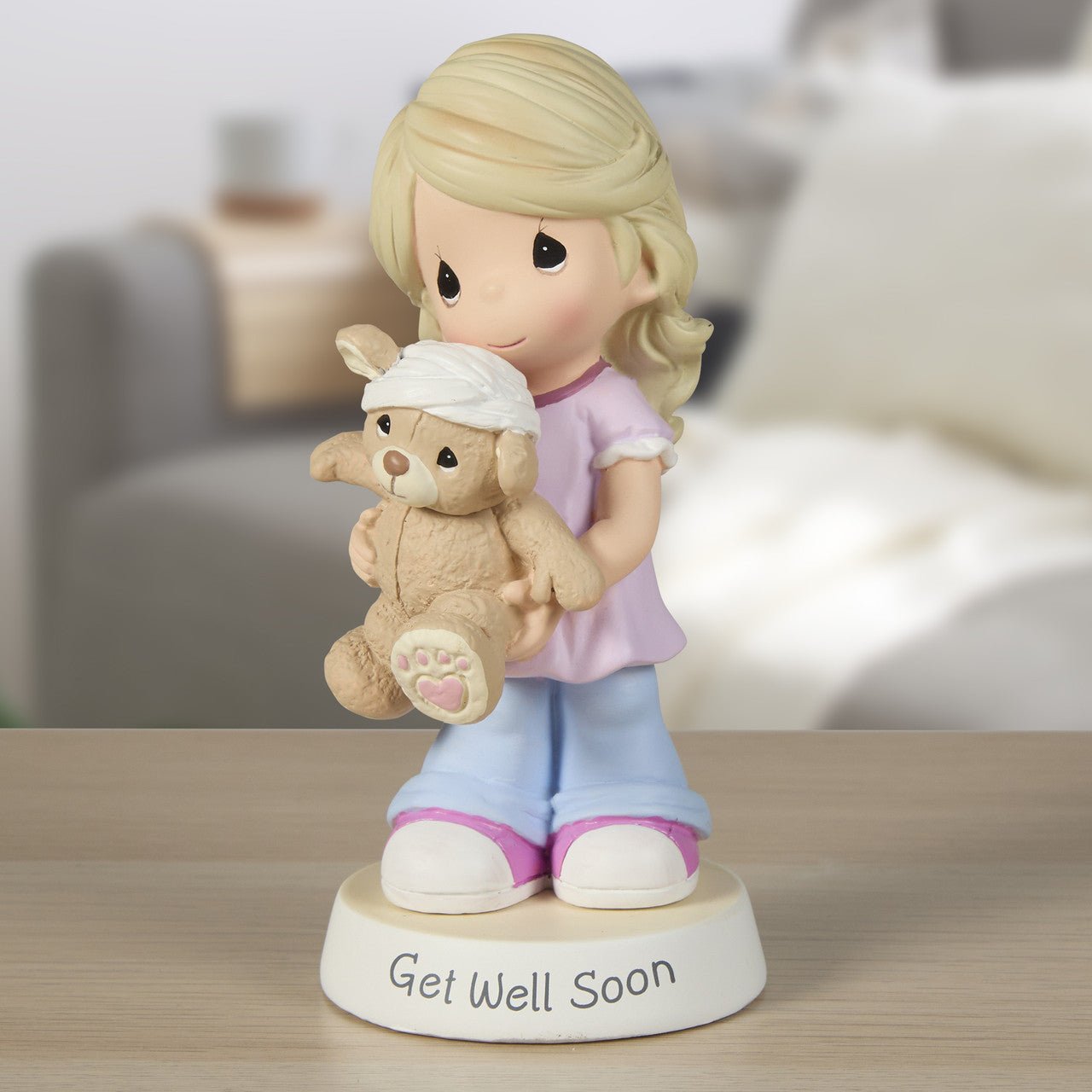 Girl with Teddy Bear Figurine