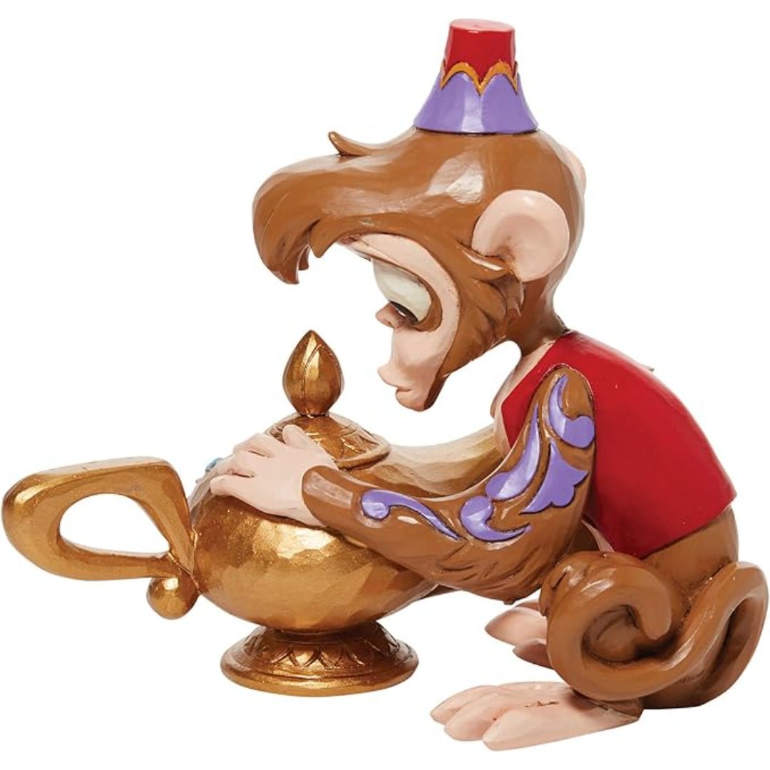 Jim Shore Disney Traditions Aladdin Abu Holding The Genie Lamp Figurine, 4.5"