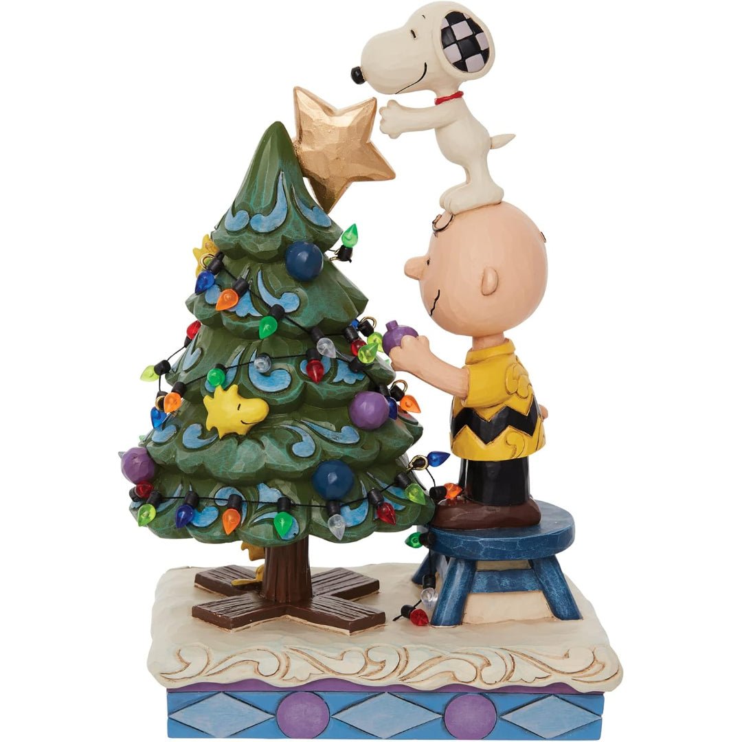 Jim Shore Peanuts Charlie Brown and Snoopy Decorating The Tree Figurine, 8.27"