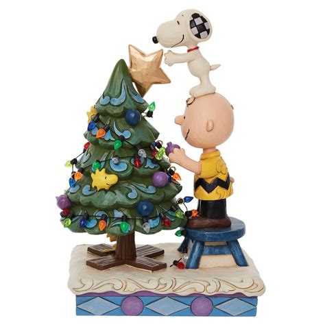 Jim Shore Peanuts Charlie Brown and Snoopy Decorating The Tree Figurine, 8.27"