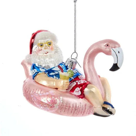 Noble Gems™ Glass Santa In Flamingo Pool Float Ornament