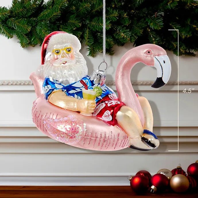 Noble Gems™ Glass Santa In Flamingo Pool Float Ornament