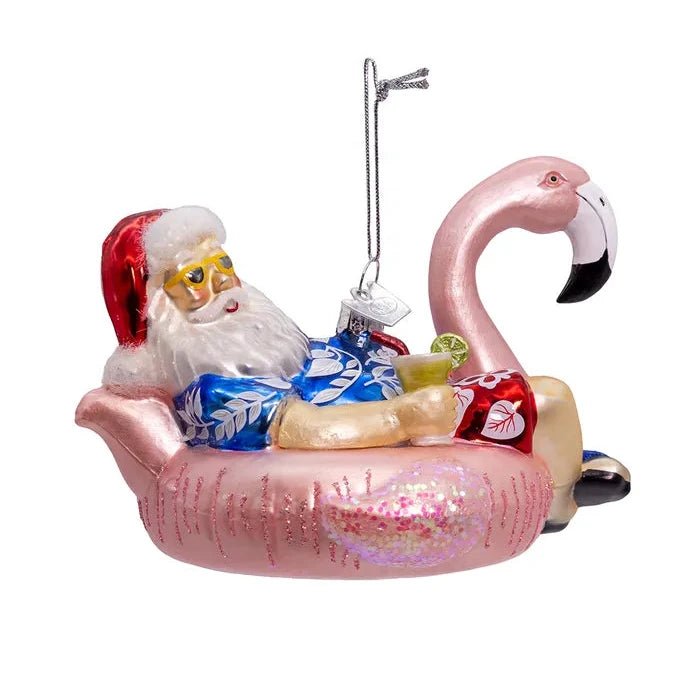 Noble Gems™ Glass Santa In Flamingo Pool Float Ornament