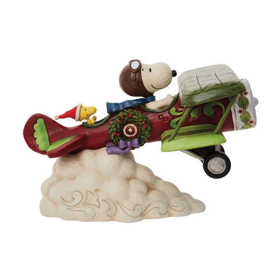 Peanuts by Jim Shore Snoopy Flying Christmas Ace Plane Figurine