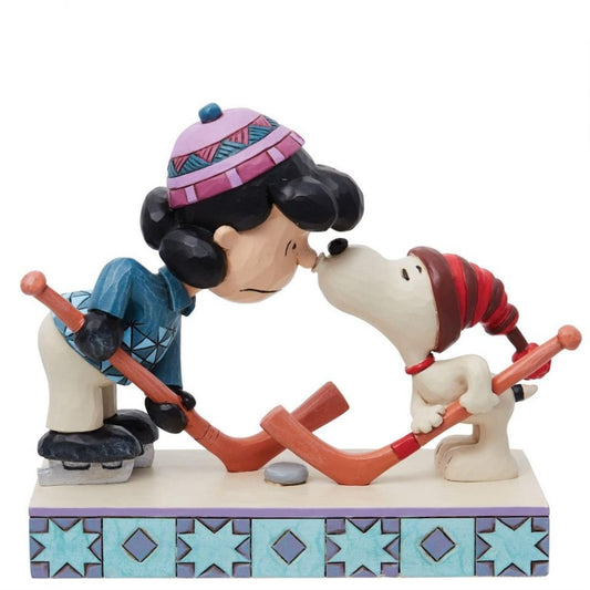 Peanuts by Jim Shore Snoopy & Lucy Playing Hockey Figurine