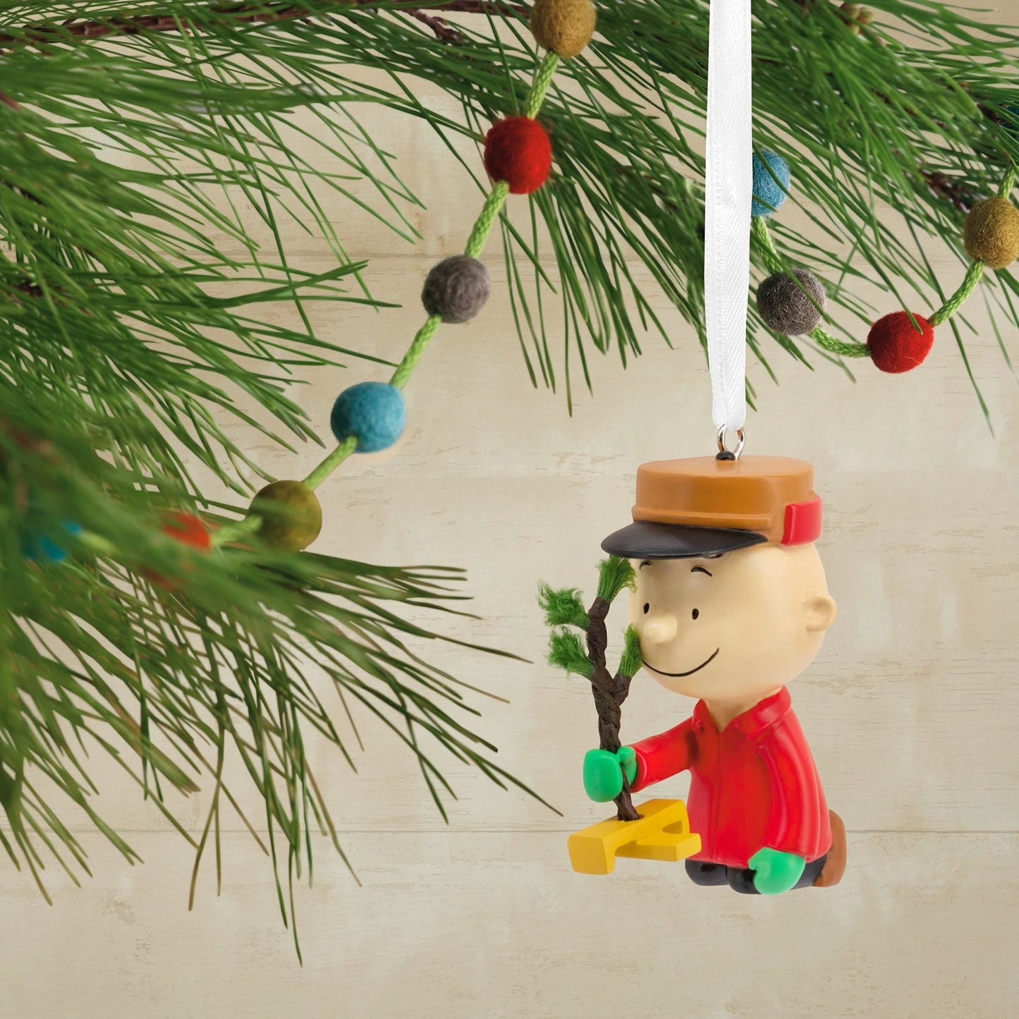 Peanuts Charlie Brown Kneeling with Tree Hallmark Ornament